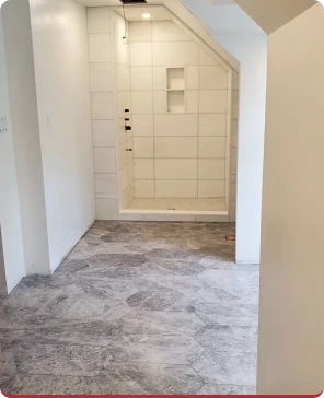 Finished hallway closet with tile flooring